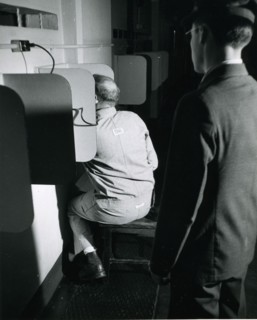 Alcatraz prisoner making a phone call. Alcatraz Prison, San Francisco, 1950's
