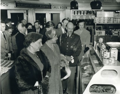 First Lady Mamie Eisenhower and Queen Mother Elizabeth examine the nut counter at a Washington, DC Walgreen's Drug Store. November 6, 1954. Photo: Abbie Rowe