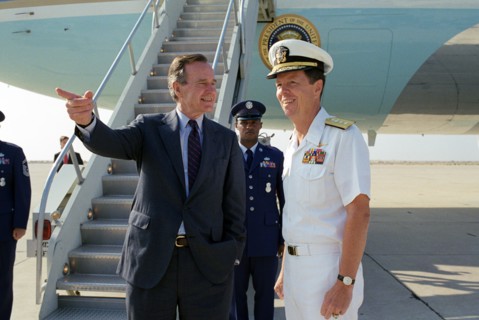 US President George H.W. Bush greeted at NAS Miramar by US Navy (USN) Rear Admiral (RADM) Paul W. Parcells 9 14 1992.