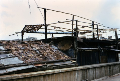 (R) 1973 - Drying seafood in Macau.
