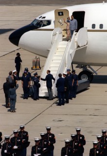 Vice Premier Geng Biao of China and his wife wave goodbye as they prepare to leave California aboard Vice President Walter Mondale's official aircraft..