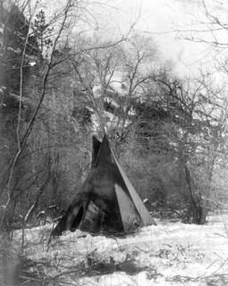 Edward S. Curtis Native American Indians - A Sioux Indian teepee in a winter camp circa 1908.