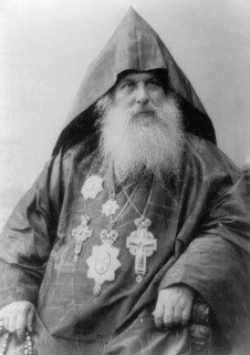 Patriarch Harootiun Vehabedian of the Armenian church wearing hood, robe and five medals, half-length portrait, facing right 1880-1924.