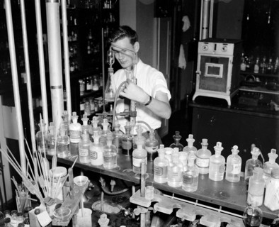 Cosmetics being tested by a worker at the Department of Agriculture circa 1937.