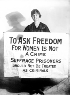 Woman Suffrage Movement - Woman suffragette Lucy Branham holding poster circa 1919.
