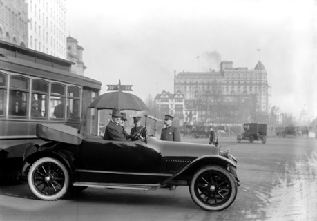 Washington D.C. History - Car on Washington Street obeying stop and go traffic sign circa 1913.
