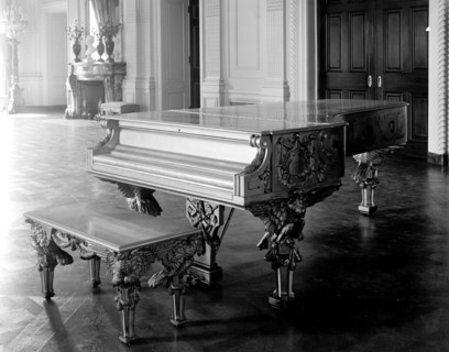 Gold piano inside White House circa 1928.