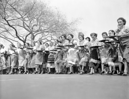 First annual waitresses derby in Washington D.C., waitresses carrying cocktail setups  circa 1937.