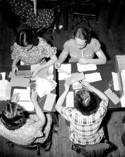 Social Security Board Records Office - Here the original application and the master card are brought together and checked for error. Checking is done by a team of two workers, and the few errors which...