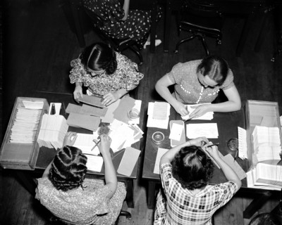 Social Security Board Records Office - Here the original application and the master card are brought together and checked for error. Checking is done by a team of two workers, and the few errors which...