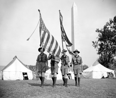 Boy Scouts Color Guard holding flags at the Boy Scout Jamboree in Washington D.C. circa 1937.