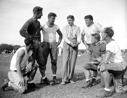 George Marshall, owner of the Washington Redskins, talks with some of his players, left to right: Wayne Millner, Charlie Malone, Vic Carroll, George Marshall, Bill Young, Ed Michaels, Jim Garber circa...