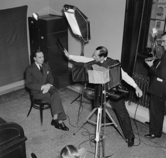 January 7, 1938 - Edsel Ford, auto magnate, poses for the Harris-Ewing photographer just before he is questioned by the Senate Rail Investigating Committee.
