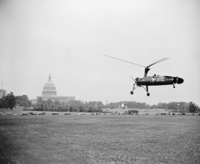 May 19, 1938 - experimental auto giro mail delivery service with U.S. Capitol in background .