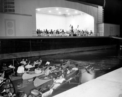 People in canoes listening to the National Symphony Orchestra circa 1938 .