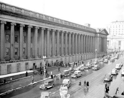 Cars and pedestrians in Washington D.C. street scene circa 1938 or 1939 (15th Street) .