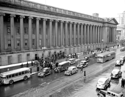 Cars, buses and pedestrians in Washington D.C. street scene circa 1938 or 1939 (15th Street) .
