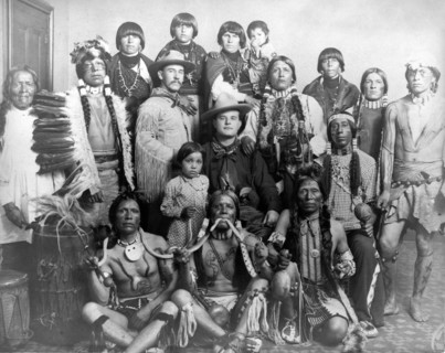Edward S. Curtis Native American Indians - Group of Pueblo Indians, three men in front holding snakes, two Caucasian men in center circa 1905.