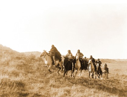 Edward S. Curtis Native American Indians - Cheyene Indians riding horses circa 1910.