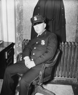 Fred. C. Parker, alleged life threatener of Sen. Huey Long, as he appeared at his post of duty in the House office building where he works as a member of the Capitol police force circa February 8, 193...