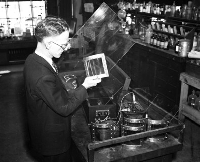 Man working in a laboratory circa 1936.