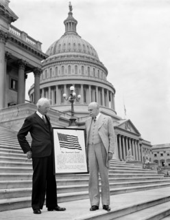 Men holding sign 'The American's Creed' in front of U.S. Capitol, Washington, D.C. circa 1936.