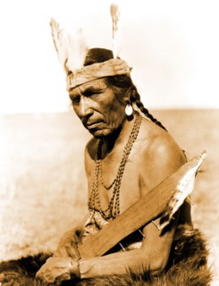 Edward S. Curtis Native American Indians - Fat Horse with insignia of a Blackfoot soldier circa 1927.