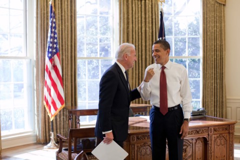 President Barack Obama and Vice President Joe Biden laugh together in the Oval Office, 1/22/09. .