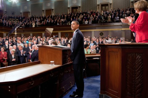 President Barack Obama looks towards the First Lady and guests seated in the gallery of the House Chamber at the U.S. Capitol in Washington, D.C., Sept. 9, 2009..