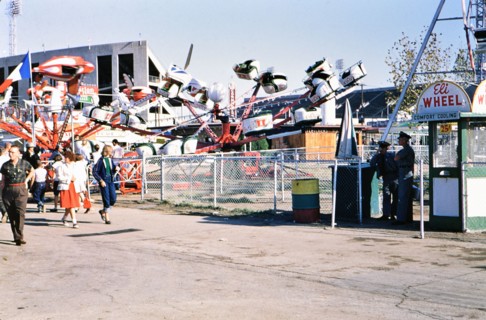 Amusement carnival rides at the Texas State Fair circa 1954-1956.