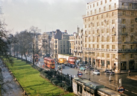 1961 London - Green Park Underground Station, double decker busses, city traffic.