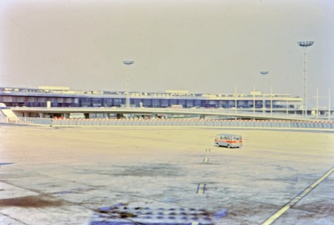 1972 France - (R) - A van driving across the tarmac at Orly Airport in Paris.