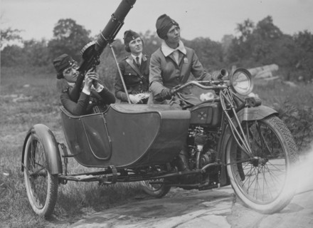 Policewomen With Machine Gun