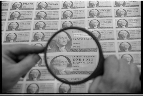 Gasoline Rationing Stamps Being Inspected, 1974