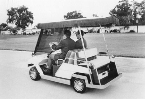 Nixon and Kissinger Ride in Golf Cart