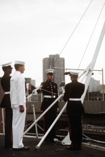 Raising the colors aboard the USS IWO JIMA
