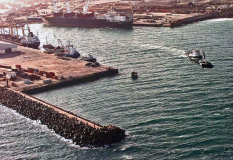 1992 - Aerial view of the Port of Mogadishu.  Three cargo ships