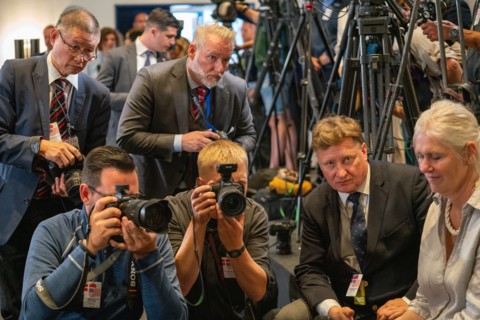 Photographers take photos