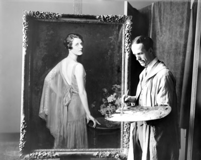 Artist Douglas Chandor painting in studio