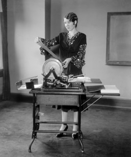 Student at Strayers Business College working equipment