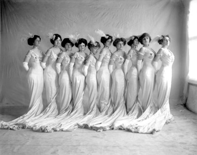 Beautiful women in long white gowns