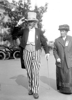 Man dressed as Uncle Sam at a parade in 1916.