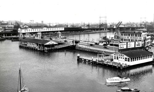 This photograph depicts a low aerial view of the wharves