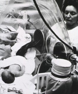 Neonatal - neo natal unit of hospital in 1960s possibly NIH.