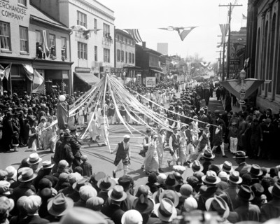 School children march in parade to welcome Apple Blossom Festival