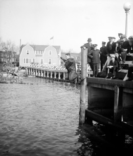 Man jumping off dock