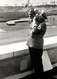 Nazi soldier with camera taking a photograph
