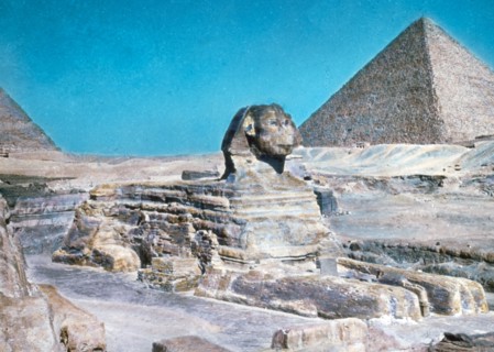 Original Caption:  Cairo and the pyramids