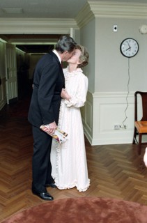 President Reagan kissing Nancy Reagan.