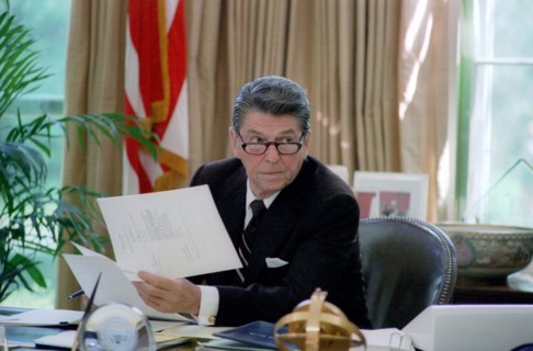 President Reagan wearing glasses.